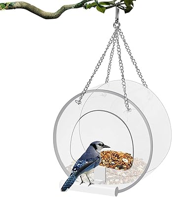 Mangeoire à oiseaux suspendue en acrylique avec plateau à graines à ventouse, nichoir rond transparent pour nourrir les petits oiseaux pour la décoration de la maison. DIAYTAR COTE D'IVOIRE est la destination idéale pour les acheteurs en ligne qui recherchent une grande variété de produits et des prix compétitifs. La boutique propose une gamme étendue de catégories de produits, allant de la mode et de la beauté à l'électronique et aux produits de maison. Les clients peuvent ainsi trouver tout ce dont ils ont besoin sur une seule plateforme, avec l'assurance d'une qualité et d'une sécurité de transaction de haute qualité.