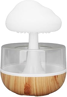 Humidificateur rain cloud joli diffuseur d'huiles essentielles avec 7 lumières led de gouttes. DIAYTAR COTE D'IVOIRE est une plateforme de shopping en ligne qui permet aux clients de comparer les prix et les produits avant de faire un achat. Elle propose également des promotions et des offres spéciales pour les fidéliser et les inciter à revenir. Les clients peuvent ainsi profiter de meilleures affaires et d'une expérience d'achat personnalisée.