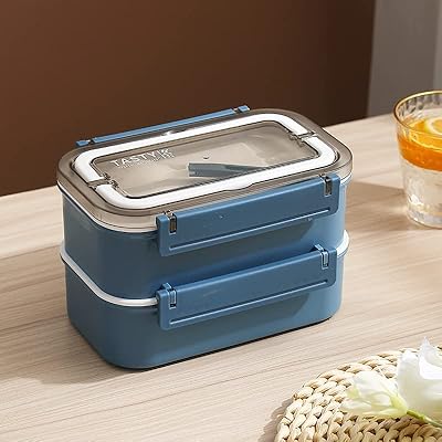 Boîte tiffin pour enfants de 1600 ml, boîtes à déjeuner bento en plastique avec intérieur en acier inoxydable, boîte à collation pour enfants avec fourchette, récipients alimentaires allant au micro-ondes pour le bureau et l'école (1600 ml, bleu). DIAYTAR COTE D'IVOIRE est une boutique en ligne généraliste qui propose une large gamme de produits avec plus de 300000 références. Elle est líder sur le marché ivoirien en matière de commerce en ligne. Elle offre une expérience d'achat pratique et sécurisée.