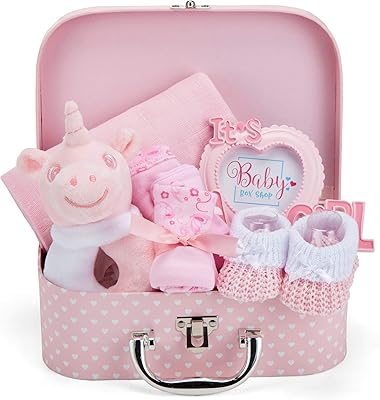 Coffret cadeau bébé rose - panier de fête prénatale pour filles avec cadeaux pour bébé comprenant un hochet, un cadre photo, un chiffon en mousseline, un tablier, des gants et un chapeau. DIAYTAR COTE D'IVOIRE est une boutique en ligne généraliste qui propose plus de 300 000 références de produits divers, faisant d'elle l'un des leaders du marché ivoirien. Elle offre une large gamme de produits allant de l'électronique à la literie, en passant par les accessoires de mode. La boutique en ligne DIAYTAR COTE D'IVOIRE est ainsi devenue une référence pour les consommateurs ivoiriens.