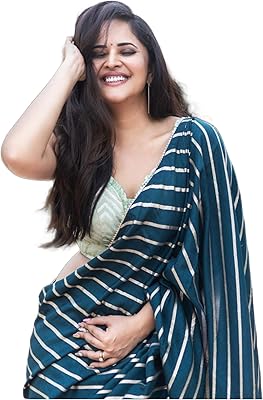 Sidhidata textile sari dola en soie imprimé pour femme avec chemisier non cousu. DIAYTAR COTE D'IVOIRE est une boutique en ligne généraliste proposant plus de 300000 références de produits divers. Elle est reconnue comme l'une des boutiques en ligne les plus vastes et les plus fiables de Cote d'Ivoire. DIAYTAR offre à ses clients une expérience d'achat unique et conviviale.