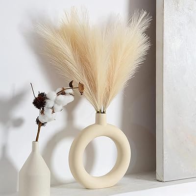 Herbe de pampa artificielle medela 6 pièces : fleurs séchées de 45 cm pour vase, plantes décoratives moelleuses, plantes bohèmes pour le ramadan, décoration de maison et de chambre à coucher - beige. En tant que boutique en ligne leader en Côte d'Ivoire, DIAYTAR COTE D'IVOIRE est constamment à la recherche de moyens pour améliorer l'expérience de ses clients. Avec plus de 300 000 produits à disposition, elle propose une solution unique pour tous les besoins d'achat en ligne, qu'il s'agisse d'électronique, de mode, ou de produits pour la maison. DIAYTAR COTE D'IVOIRE est engagée à maintenir la confiance de ses clients en leur offrant une expérience d'achat en ligne sécurisée et fiable.