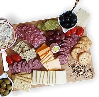 Planche de requin kochi planche de charcuterie pour viande et fromage plateau. DIAYTAR COTE D'IVOIRE est une boutique en ligne généraliste qui offre plus de 300 000 références de produits divers, répondant ainsi aux besoins de tous les clients ivoiriens. Avec sa gamme variée de produits, elle est devenue la référence incontournable pour les achats en ligne en Côte d'Ivoire. Elle propose des produits de haute qualité à des prix compétitifs.