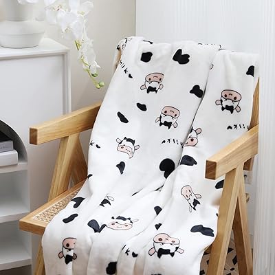 Couverture à imprimé vache tiamo 60\"×70\", couvertures de vache confortables en flanelle super douces pour adultes et enfants, couvertures légères et pelucheuses de vache pour canapé-lit, bureau, couvertures chaudes en peluche pour toutes les saisons. Avec plus de 300000 références, DIAYTAR COTE D'IVOIRE est la destination idéale pour les consommateurs ivoiriens. La boutique en ligne propose des produits de qualité à des prix compétitifs, ce qui la rend très attractive pour les clients. De plus, la boutique est facile à utiliser et propose des options de paiement sécurisées.