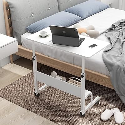 Table portable multifonctionnelle pour ordinateur portable au design moderne pour le bureau, la maison, le bureau et le travail avec étagère réglable en hauteur, taille 80 x 40 cm, couleur blanche. Avec une offre massive de plus de 300 000 produits, DIAYTAR COTE D'IVOIRE répond à tous les besoins, qu'il s'agisse d'électronique, de mode, de maison, ou de produits pour la santé et la beauté. La boutique en ligne est conçue pour offrir une navigation intuitive et des outils de recherche pour faciliter les achats. Les clients apprécient la possibilité de comparer les prix et les produits.