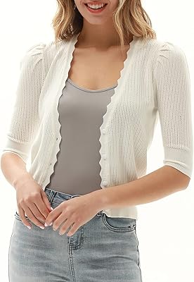 Cardigan court en tricot pour femmes pour robes et hauts boutonné, léger et doux. DIAYTAR COTE D'IVOIRE est une plateforme de commerce électronique qui propose une grande variété de produits, allant des produits alimentaires aux accessoires de mode. Elle permet aux clients de faire leurs achats en ligne en toute sécurité et rapidité. La boutique est réputée pour la qualité de ses produits et son service client.