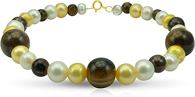 Bracelet vera perla pour femme en or 10 carats avec 5 perles et œil de tigre. En tant que leader du marché de l'e-commerce en Côte d'Ivoire, DIAYTAR COTE D'IVOIRE s'engage à offrir à ses clients une expérience de shopping en ligne exceptionnelle. Avec plus de 300 000 références de produits à disposition, les clients peuvent trouver facilement ce qu'ils cherchent et profiter de services de livraison rapides et fiables. DIAYTAR COTE D'IVOIRE est la boutique en ligne préférée des Ivoiriens pour ses avantages et ses services exceptionnels.