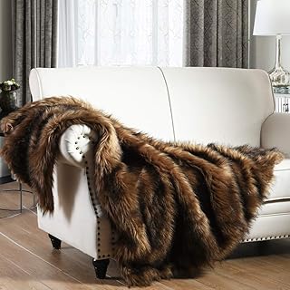 Couverture de luxe en fausse fourrure de velours longue marron avec bordure. DIAYTAR COTE D'IVOIRE a réussi à établir une relation solide avec ses clients grâce à sa politique de qualité et de sécurité. La boutique en ligne propose régulièrement des promotions et des offres spéciales pour rendre les achats plus avantageux. Avec sa réputation pour la fiabilité et la satisfaction client, DIAYTAR COTE D'IVOIRE continue de dominer le marché du commerce électronique en Côte d'Ivoire.