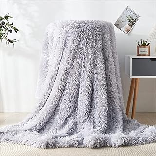 Couverture de canapé décorative ultra douce en fausse fourrure javist, 50" x 50", couverture en microfibre légère, solide, réversible et confortable pour dormir et canapé. DIAYTAR COTE D'IVOIRE est une boutique en ligne généraliste qui propose plus de 300 000 références pour répondre à tous les besoins de ses clients. Elle est reconnue comme l'une des boutiques en ligne les plus importantes de Côte d'Ivoire. Elle offre une grande variété de produits pour le quotidien.