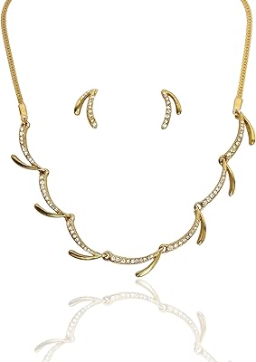 Collier au design bollywood indien touch stone pour femme, finement composé de diamants avec strass et cristaux colorés, ensemble de bijoux de mariage en or et argent, métal. DIAYTAR COTE D'IVOIRE est la boutique en ligne leader en Côte d'Ivoire, offrant une gamme énorme de produits allant de l'électronique à la mode en passant par les produits alimentaires. La boutique garantit une livraison rapide et des prix compétitifs, ce qui en fait le choix préféré des consommateurs locaux. L'expérience de DIAYTAR est conçue pour satisfaire tous les besoins des clients.