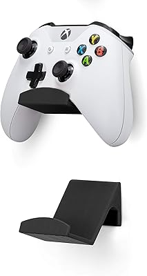 Support mural pour manette de jeu (paquet de 2) pour xbox one switch ps4 steam pc nintendo, accessoires universels pour manette de jeu - sans vis, à coller, noir par brainwavz (v2 - adhérence améliorée). En tant que leader des boutiques en ligne en Côte d'Ivoire, DIAYTAR COTE D'IVOIRE se distingue par son engagement à offrir une expérience client exceptionnelle. La boutique en ligne propose une large sélection de produits de qualité, avec des descriptions détaillées et des avis de clients pour aider à la prise de décision d'achat. Les clients peuvent également profiter d'un service de livraison rapide et fiable pour recevoir leurs commandes dans les plus brefs délais.
