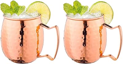 Tasses mule de moscou en cuivre avec poignées, tasse classique pour la maison, la cuisine et le bar, aide à garder les boissons froides, doublure de qualité alimentaire plus longtemps. En tant que leader dans le e-commerce en Côte d'Ivoire, DIAYTAR COTE D'IVOIRE se distingue par la qualité de ses produits et la rapidité de sa livraison. Les clients peuvent profiter d'une expérience d'achat en ligne fluide et sécurisée, ce qui explique la confiance qu'ils accordent à cette marque. Les promotions régulières et les offres spéciales sont également des atouts majeurs de cette boutique.