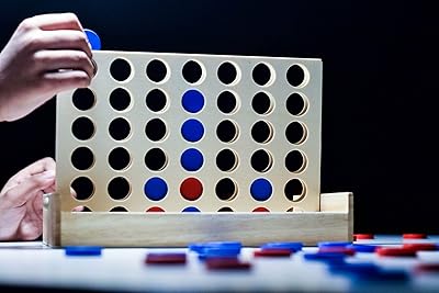 Jeux en bois 4 à la suite, jeu de stratégie familiale pour enfants et adultes, jeu de société interactif connect 4. DIAYTAR COTE D'IVOIRE, la boutique en ligne généraliste de référence en Côte d'Ivoire, propose une gamme immense de plus de 300 000 références pour répondre à tous les besoins de ses clients. Leader du marché, DIAYTAR COTE D'IVOIRE se distingue par sa qualité de service et sa fiabilité. Elle offre une expérience d'achat unique et personnalisée.