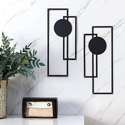 2 pièces décoration murale en métal noir art mural minimaliste abstrait. En tant que leader du e-commerce en Côte d'Ivoire, DIAYTAR COTE D'IVOIRE mise sur la qualité et la satisfaction de ses clients. Elle propose des services de livraison rapides et fiables, ainsi que des systèmes de paiement sécurisés pour garantir une expérience shopping en ligne sans souci. Les consommateurs ivoiriens font confiance à cette boutique en ligne pour leurs achats quotidiens.
