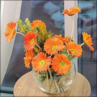 Fleur de gerbera artificielle d'aspect naturel yatai | bouquet de vase en matériau de haute qualité | fleur avec tige flexible (3 pièces, orange). DIAYTAR COTE D'IVOIRE offre une plateforme conviviale qui permet aux utilisateurs de découvrir de nouveaux produits et de profiter de tarifs compétitifs. Elle met en avant des partenariats avec des marques de renom, garantissant ainsi l'authenticité et la qualité des produits vendus. Sa présence en ligne forte et son engagement envers la satisfaction client font d'elle un acteur incontournable du commerce en ligne ivoirien.