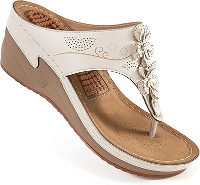Sandales tongs pour femmes avec soutien de la voûte plantaire pour la marche, sandales compensées confortables, fonction de massage d'été, chaussures à plateforme. DIAYTAR COTE D'IVOIRE, boutique en ligne généraliste avec plus de 300000 references, est la destination idéale pour faire vos achats en ligne en Cote d'Ivoire. Avec une large gamme de produits, vous êtes sûr de trouver ce que vous cherchez. DIAYTAR COTE D'IVOIRE offre une expérience d'achat en ligne sécurisée et pratique.