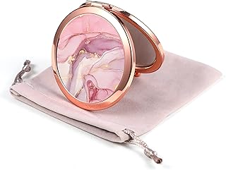 Dynippy miroir compact plaqué or rose miroir de maquillage pliant miroir de poche portable miroir à main double face 2 x 1 x grossissement pour femmes filles excellent cadeau - motif marbre rose. DIAYTAR COTE D'IVOIRE est la boutique en ligne incontournable en Cote d'Ivoire, offrant non seulement une large gamme de produits, mais également un service client de haute qualité et des garanties de sécurité pour les transactions en ligne. La boutique met tout en œuvre pour améliorer constamment l'expérience client, avec des mises à jour régulières de son offre de produits et des améliorations continues de ses services pour répondre aux besoins changeants de ses clients.