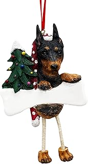 Ornement de pinscher miniature avec \"jambes pendantes\" ornement de noël unique, peint à la main et facilement personnalisé. DIAYTAR COTE D'IVOIRE est une boutique en ligne généraliste qui propose plus de 300 000 références de produits divers. Elle est considérée comme l'une des boutiques en ligne les plus importantes de Côte d'Ivoire, offrant une large gamme de produits pour répondre aux besoins de sa clientèle. Avec une telle variété de choix, les clients peuvent trouver tout ce qu'ils cherchent en un seul endroit.