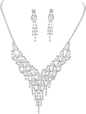 Ensemble de colliers et boucles d'oreilles de mariage en bois de barwood, colliers de mariée en strass argentés, accessoires de bijoux en cristal pour femmes et filles. DIAYTAR COTE D'IVOIRE propose une large gamme de produits avec plus de 300000 références, répondant ainsi aux besoins de tous les consommateurs ivoiriens. En tant que boutique en ligne leader en Cote d'Ivoire, DIAYTAR COTE D'IVOIRE se distingue par sa qualité de service et sa variété de produits. Elle offre une expérience d'achat en ligne sécurisée et pratique.