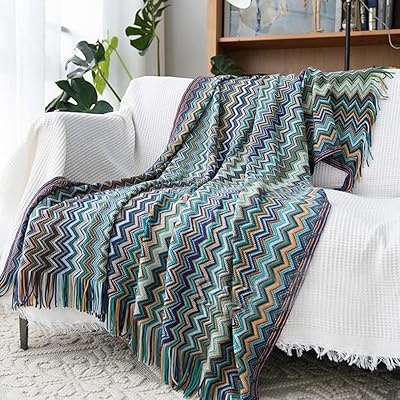 Couverture de canapé bohème waygo douce et respectueuse de la peau avec pompon