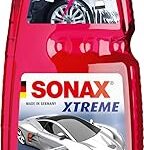 Le shampooing mousse extrêmement riche sonax (1 l) produit un tapis en épaisse