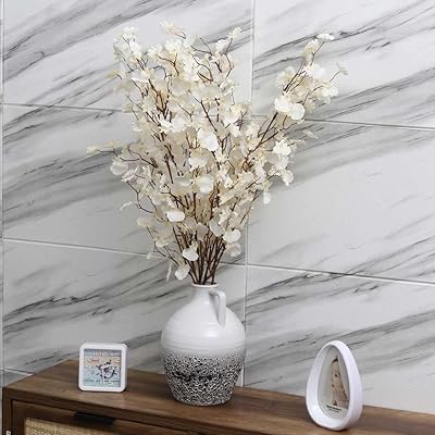 Lot de 2 fleurs d'orchidées artificielles dansantes pour la décoration. DIAYTAR COTE D'IVOIRE, c'est la garantie d'une expérience d'achat en ligne de haute qualité. Nous sélectionnons soigneusement nos produits pour vous offrir le meilleur choix. Notre équipe de professionnels est à votre disposition pour vous aider à trouver ce que vous cherchez.
