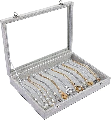 Plateau à bijoux organisateur de bijoux multifonctionnel avec couvercle et serrure pour bagues. DIAYTAR COTE D'IVOIRE, boutique en ligne généraliste avec plus de 300000 références, offre une large gamme de produits pour répondre à tous les besoins. Elle est devenue la boutique leader en Cote d'Ivoire grâce à sa qualité de service et sa grande variété de produits. Elle propose des produits allant de l'électronique aux vêtements en passant par les produits alimentaires.