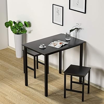 Ensemble de salle à manger 3 pièces dklg, tables et chaises de cuisine pour salon pour deux, parfait pour le coin petit-déjeuner, noir. La boutique en ligne DIAYTAR COTE D'IVOIRE offre une large gamme de produits allant de l'électronique à la mode, en passant par les produits alimentaires. Avec plus de 300 000 références, les clients peuvent trouver tout ce dont ils ont besoin sous un seul toit. La boutique est connue pour sa qualité de service et ses prix compétitifs.