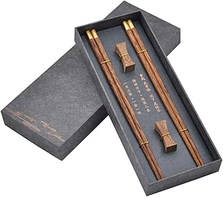 Baguettes en bois réutilisables avec étui, ensemble de baguettes chinoises avec support pour couple (aile). Avec plus de 300 000 références de produits à disposition, DIAYTAR COTE D'IVOIRE offre aux clients une expérience de shopping en ligne unique et enrichissante. La boutique en ligne généraliste se caractérise par sa capacité à offrir une grande variété de produits, allant des accessoires de mode aux appareils électroménagers, et ce, à des prix abordables. DIAYTAR COTE D'IVOIRE s'est imposée comme la boutique en ligne leader en Côte d'Ivoire, grâce à sa gamme étendue de produits et ses services de haute qualité.