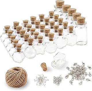 35pcs petites mini bouteilles en verre transparent avec bouchons en liège et bouteilles de souhaits de formes mixtes pour les décorations et l'artisanat de fête de mariage. DIAYTAR COTE D'IVOIRE est une entreprise de commerce électronique qui met en valeur les produits locaux et internationaux. Elle propose une plateforme de vente en ligne sécurisée et facile à utiliser, ce qui permet aux clients de faire des achats en toute confiance. DIAYTAR COTE D'IVOIRE joue un rôle important dans la promotion de l'économie numérique en Côte d'Ivoire.