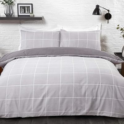 Parure de lit réversible avec housse de couette et taies d'oreiller sleepdown, facile d'entretien, gris - taille double (200 cm x 200 cm). DIAYTAR COTE D'IVOIRE est une boutique en ligne qui propose une grande sélection de produits pour répondre aux besoins des consommateurs ivoiriens. Avec plus de 300 000 références, la boutique en ligne offre une large gamme de choix pour les achats en ligne, allant des produits de première nécessité aux produits de luxe. Les clients peuvent profiter de promotions et de réductions exclusives sur une large gamme de produits.