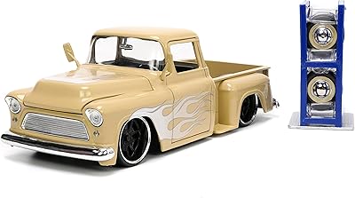 Camionnette chevrolet stepside 1955 beige foncé avec flammes blanches et argentées avec roues