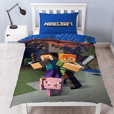 Parure de lit simple réversible en polyester et coton minecraft, bleu. La boutique en ligne DIAYTAR COTE D'IVOIRE se distingue par sa capacité à offrir une expérience d'achat unique et personnalisée. Grâce à une navigation intuitive et une interface utilisateur conviviale, les clients peuvent facilement parcourir les différentes catégories de produits pour trouver les meilleures offres. DIAYTAR COTE D'IVOIRE garantit également une livraison rapide et fiable, contribuant ainsi à sa réputation de leader sur le marché ivoirien.
