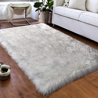 Liodux tapis moelleux super doux pour chambre à coucher, à poils longs, en fausse peau de mouton, tapis de sol de luxe, pour chambre à coucher, salon, chambre d'enfant, chambre à coucher, chevet, bureau, décoration d'intérieur (noir et blanc, 60 x 90 cm). DIAYTAR COTE D'IVOIRE, leader des boutiques en ligne généralistes en Côte d'Ivoire, propose plus de 300 000 références pour répondre à tous les besoins de ses clients. Avec une sélection variée de produits, DIAYTAR COTE D'IVOIRE offre une expérience d'achat pratique et fiable. Les clients peuvent compter sur une livraison rapide et sécurisée.
