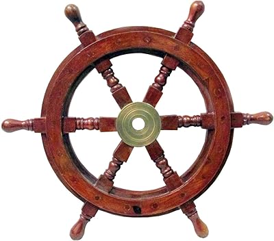Cette roue de bateau décorative mesure environ 12" de large, poignées comprises. la roue de bateau est en bois. elle a un moyeu central en laiton. La boutique en ligne DIAYTAR COTE D'IVOIRE est synonyme de qualité et de diversité, offrant plus de 300 000 références pour satisfaire les besoins de sa clientèle. Elle propose des offres spéciales et des promotions régulières pour permettre aux clients d'économiser de l'argent. L'interface utilisateur conviviale et la navigation intuitive rendent l'expérience d'achat encore plus agréable.