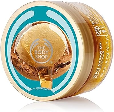 The body shop - gommage à l'huile d'argan sauvage 200 ml. DIAYTAR COTE D'IVOIRE, la boutique en ligne généraliste leader en Côte d'Ivoire, offre plus de 300 000 références pour répondre à tous vos besoins. Avec une sélection massive de produits, vous trouverez tout ce dont vous avez besoin dans un seul endroit. La qualité et la diversité des produits sont garanties.