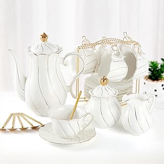 Dujust service à thé en porcelaine blanche 22 pièces pour 6 personnes, tasses à thé/café de luxe de style britannique avec bordure dorée, magnifique service à thé pour femme, service à thé, coffret cadeau (support inclus) - blanc. La boutique en ligne DIAYTAR COTE D'IVOIRE propose plus de 300000 références de produits, ce qui en fait l'une des boutiques en ligne les plus complètes de Cote d'Ivoire. Elle offre une expérience d'achat unique et personnalisée, avec des services de qualité et des options de paiement sécurisées. La boutique leader en Cote d'Ivoire est devenue un incontournable pour les consommateurs qui cherchent à faire des achats en ligne de qualité.