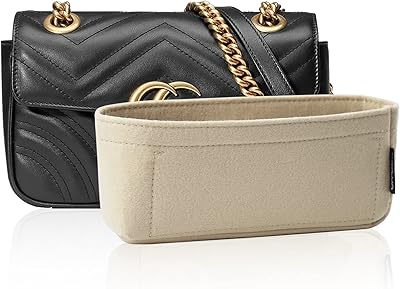 Obochet gg marmont organiseur de sac en feutre doux avec fermeture éclair, mini séparateur de sac léger pour femme (petit, beige). DIAYTAR COTE D'IVOIRE est une boutique en ligne qui propose une large gamme de produits à des prix compétitifs. La boutique est dédiée à offrir une expérience de shopping en ligne unique et pratique aux consommateurs ivoiriens, avec des services de livraison rapides et fiables. Les clients peuvent choisir parmi plus de 300000 références de produits, toutes garanties de qualité et de fiabilité.
