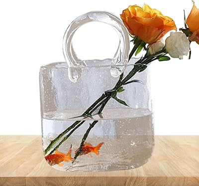 Vase de forme claire | vases en verre faits à la main, vase à fleurs en forme, aquarium unique pour mariage à domicile. La boutique en ligne DIAYTAR COTE D'IVOIRE est leader dans son domaine et propose aux clients une large gamme de produits de différentes catégories, allant de l'électronique aux articles de sport. Avec plus de 300 000 références, la boutique offre une expérience de shopping unique et personnalisée. Les clients peuvent profiter d'une livraison gratuite et d'une politique de retour flexible.