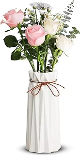 Mamatons home decor vase à fleurs en céramique de 9,5 pouces, vase à fleurs décoratif, centres de table, cuisine et salon, blanc. DIAYTAR COTE D'IVOIRE est une plateforme de e-commerce qui propose une expérience d'achat unique et personnalisée pour les clients. La boutique en ligne propose des produits de haute qualité, sélectionnés avec soin pour répondre aux besoins des consommateurs ivoiriens. Les clients peuvent profiter de la navigation facile et intuitive de la boutique en ligne pour trouver rapidement les produits qu'ils cherchent.
