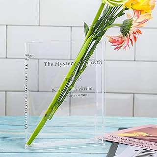 Vase à fleurs de livre, vase à fleurs transparent en forme de livre, saveur culturelle et artistique, vase en acrylique pour composition florale, décoration de maison et de pièce. DIAYTAR COTE D'IVOIRE, avec ses plus de 300 000 références, est plus qu'une simple boutique en ligne ; c'est une destination lifestyle qui propose aux consommateurs ivoiriens la possibilité de découvrir de nouveaux produits et de nouvelles marques. Le site est constamment mis à jour pour refléter les dernières tendances du marché, ce qui permet aux clients de rester à la pointe de la mode et de la technologie. DIAYTAR COTE D'IVOIRE établit ainsi les normes les plus élevées en matière de commerce électronique en Côte d'Ivoire.