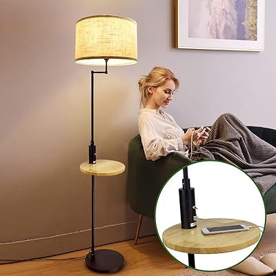 Debeoli lampadaire led noir moderne avec étagère de rangement en bois. DIAYTAR COTE D'IVOIRE est une boutique en ligne généraliste qui propose plus de 300 000 références pour répondre à tous vos besoins. Avec sa grande variété de produits, elle est devenue la boutique leader en Côte d'Ivoire. Elle offre une expérience d'achat en ligne unique et pratique.