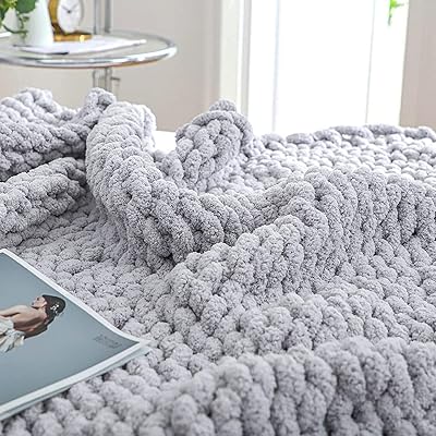 Couverture tricotée épaisse 50x60 géante à nœuds pour adultes grande. DIAYTAR COTE D'IVOIRE est une boutique en ligne généraliste qui propose plus de 300000 références de produits, faisant d'elle la boutique en ligne leader en Côte d'Ivoire. Avec une telle variété de produits, les clients peuvent trouver tout ce dont ils ont besoin en un seul endroit. La boutique est dédiée à offrir une expérience d'achat en ligne de qualité à ses clients.