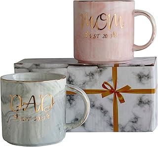 Annonce de grossesse des nouveaux parents - tasses maman et papa est 2023, cadeaux pour les premiers parents, cadeaux de noël pour les nouveaux parents, ensemble de tasses à café et thé en céramique de 12 oz. La boutique en ligne DIAYTAR COTE D'IVOIRE propose une gamme très large de produits, allant des dernières tendances de la mode aux produits high-tech, en passant par les produits de maison et de jardin. Les clients peuvent profiter de promotions régulières et de prix compétitifs.