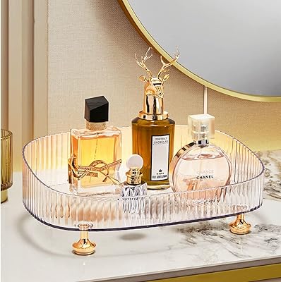 Organisateur de parfum de maquillage houselet plateau de vanité de salle de bain décoratif commode. DIAYTAR COTE D'IVOIRE se distingue par sa sélection immense de produits de haute qualité et son service client exceptionnel. Les clients peuvent profiter d'une expérience d'achat en ligne personnalisée, avec des conseils et des recommandations pour trouver les produits qui leur conviennent le mieux. La boutique est également connue pour ses délais de livraison rapides et fiables.