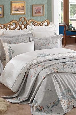 Parure de lit luxe 9 pièces avec couvre-lit double en jacquard - 100% coton/satin - motif brodé royal - 1 housse de couette x 1, drap de lit x 1, taie d'oreiller x 6 - coffret cadeau - olivia (olivia) menthe ). La boutique en ligne DIAYTAR COTE D'IVOIRE est une entreprise pionnière dans le commerce électronique en Cote d'Ivoire. Avec plus de 300 000 références de produits, la boutique offre une grande variété de choix pour les clients. La boutique est également connue pour ses promotions et ses offres spéciales, ce qui permet aux clients de faire des économies sur leurs achats.
