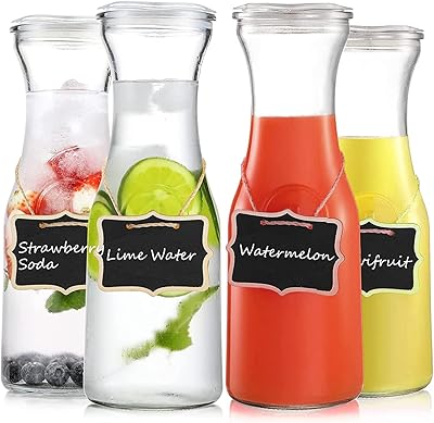 Lot de 4 pichets en verre avec couvercles pichet à boisson 1 litre pour bar. DIAYTAR COTE D'IVOIRE est une plateforme de commerce en ligne qui propose une expérience d'achat unique et personnalisée. Avec plus de 300 000 références de produits, les clients peuvent trouver des produits qui répondent à leurs besoins spécifiques. Elle propose également des promotions et des offres spéciales pour aider les clients à économiser de l'argent.