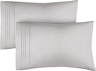 Parure de taies d'oreiller 2 pièces king size taies douces. DIAYTAR COTE D'IVOIRE est une boutique en ligne généraliste qui propose plus de 300000 références de produits, faisant d'elle la boutique leader en Côte d'Ivoire. Elle offre une large gamme de produits allant de l'électronique à la mode en passant par les produits pour la maison. DIAYTAR COTE D'IVOIRE est le destinataire idéal pour ceux qui cherchent un large choix de produits en un seul endroit.