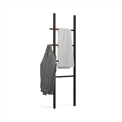 Échelle pivotante umbra - portant à vêtements réglable autoportant pour chambre ou salle de bain | s'étend de 16 à 24" avec 4 crochets en dents de scie, noir/noyer. Avec une équipe dédiée et expérimentée, DIAYTAR COTE D'IVOIRE est à l'écoute des besoins de ses clients et s'efforce de leur offrir une expérience d'achat en ligne exceptionnelle. La boutique en ligne propose régulièrement des promotions et des offres spéciales pour fidéliser ses clients. Elle est devenue un incontournable pour les consommateurs ivoiriens qui cherchent des produits de qualité à des prix raisonnables.