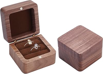 Boîte à bagues en bois, porte-bague de fiançailles, boîte à alliances carrée avec trou, boîte de rangement de bijoux pour deux bagues. DIAYTAR COTE D'IVOIRE, leader du commerce électronique en Côte d'Ivoire, met à disposition de ses clients une sélection impressionnante de plus de 300 000 références de produits. La boutique en ligne offre une expérience d'achat en ligne fluide, sécurisée et fiable. Les clients de DIAYTAR COTE D'IVOIRE bénéficient d'une large sélection de produits, de prix compétitifs et d'un service client de haute qualité.